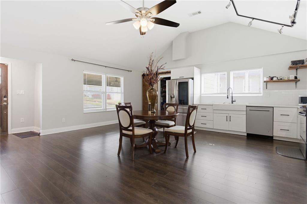 1690 Ware Avenue Atlanta, GA 30344 - Photo 5 of 25 a view of a dining room with furniture and wooden floor