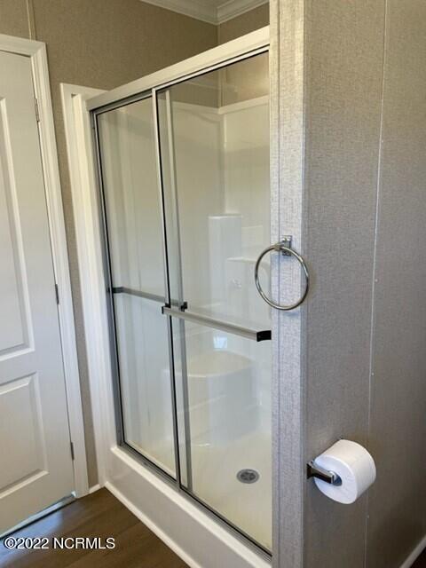 1501 Turkey Trap Road Southwest Supply, NC 28462 - Photo 10 of 31 Shower with seat in master bedroom