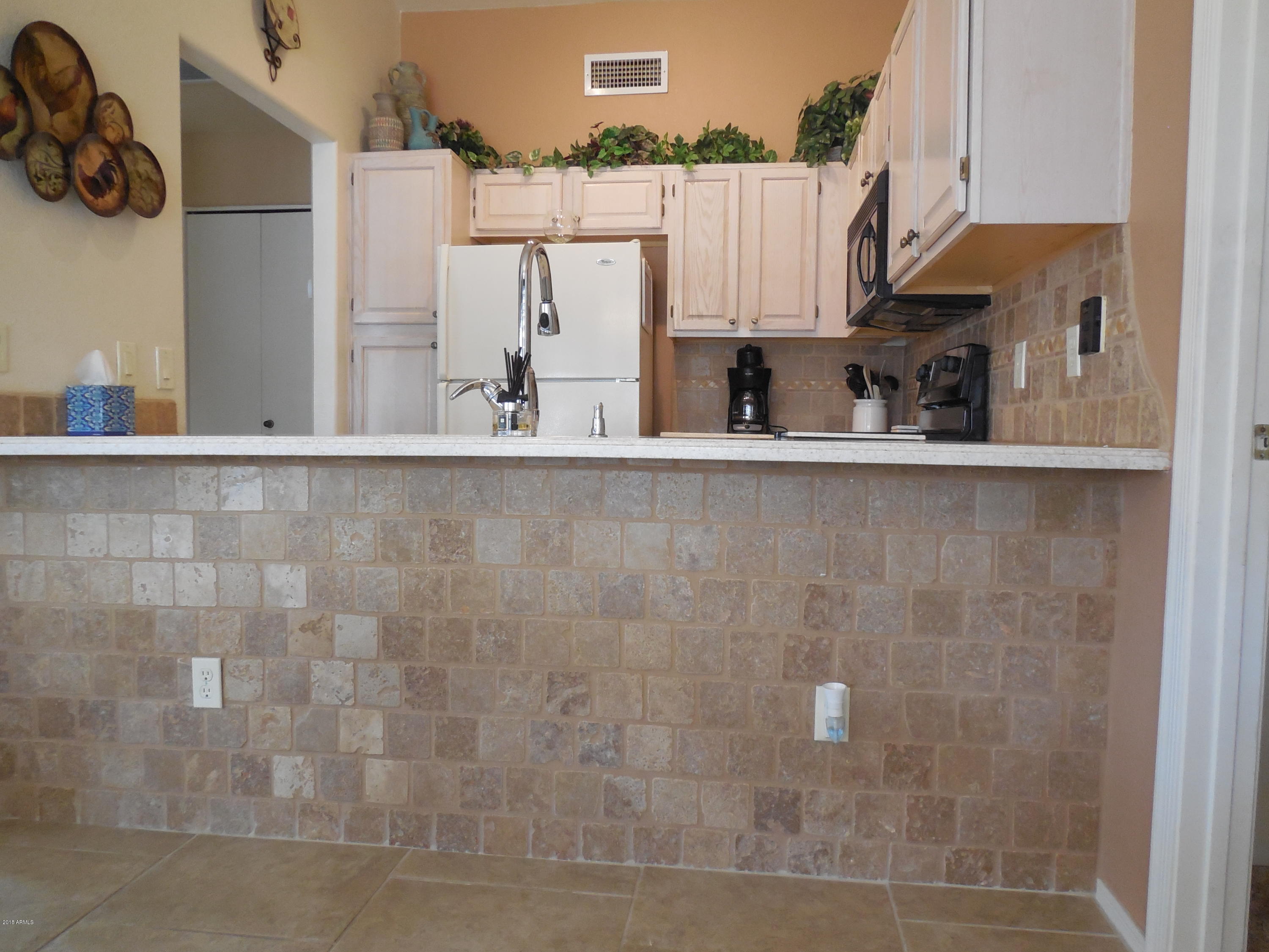 14300 West Bell Road, Unit 309 Surprise, AZ 85374 - Photo 16 of 37 Tiled Peninsula