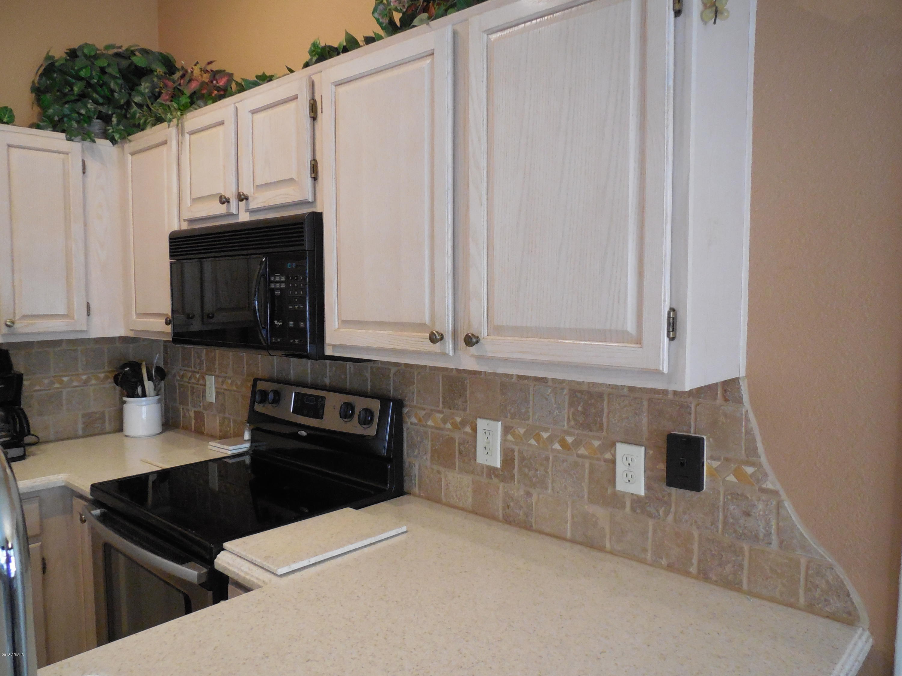 14300 West Bell Road, Unit 309 Surprise, AZ 85374 - Photo 18 of 37 Waterfall Edge on Backsplash