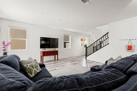 a kitchen with a stove and a sink