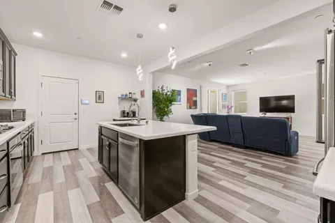 a white toilet sitting next to a bathroom sink