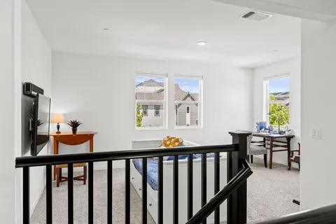 a bedroom with a bed and a cabinets