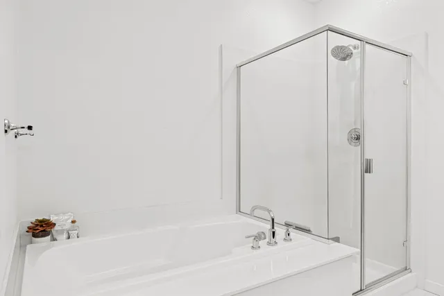 a view of a lounge chair in front of a house