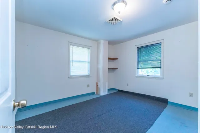 an empty room with a window