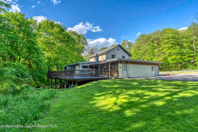 a view of outdoor space with deck and chair