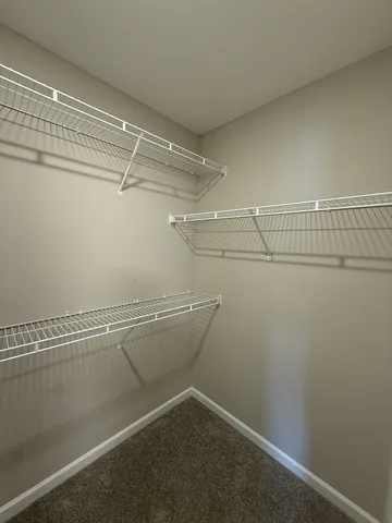 a view of a room with racks on the wall