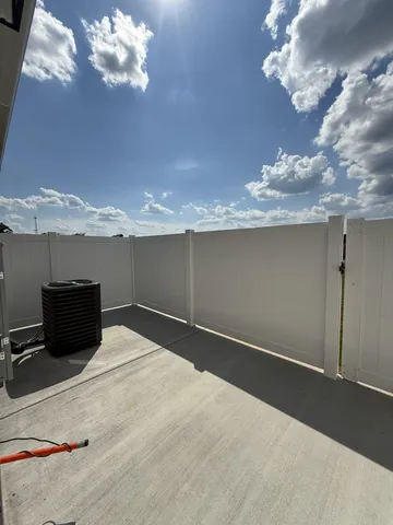 a view of a chandelier in big room