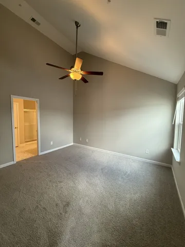 a view of a livingroom with a ceiling fan