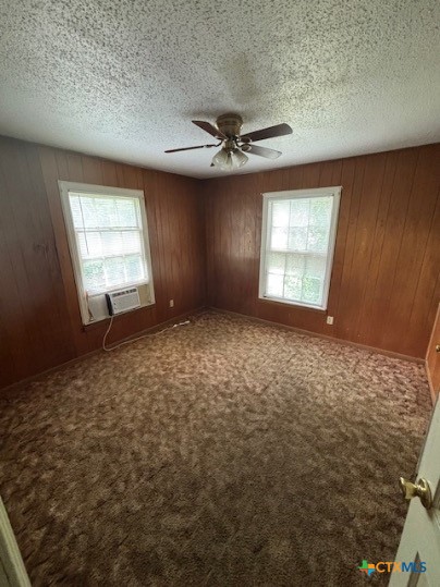 1106 Middleton Street Killeen, TX 76541 - Photo 5 of 9 en empty room with windows and ceiling fan