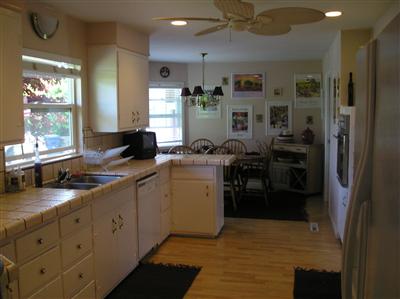 2933 Arden Way Santa Rosa, CA 95403 - Photo 7 of 10 a kitchen with cabinets and window