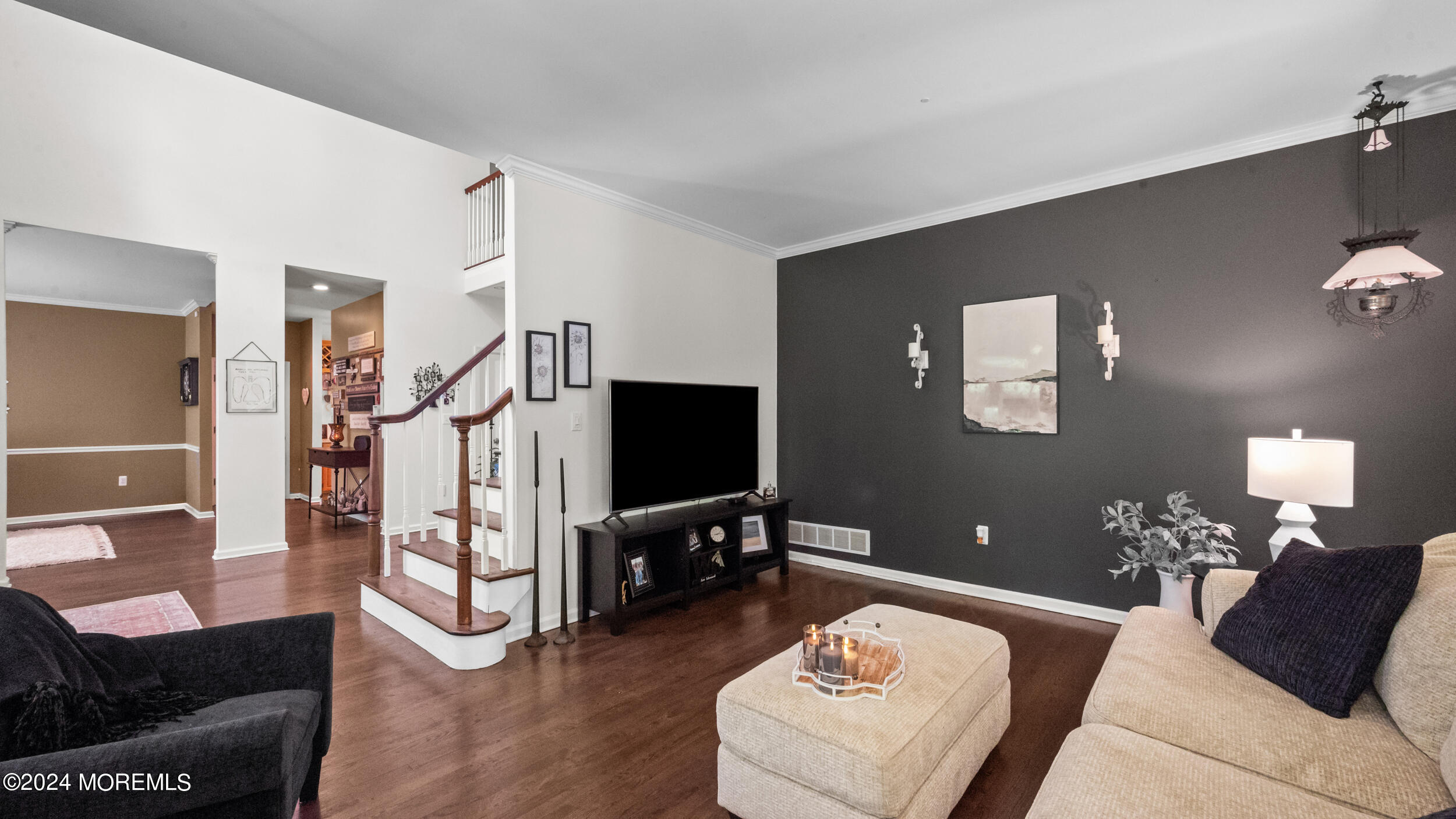 55 Tower Road Cream Ridge, NJ 08514 - Photo 12 of 47 a living room with furniture a lamp and a flat screen tv