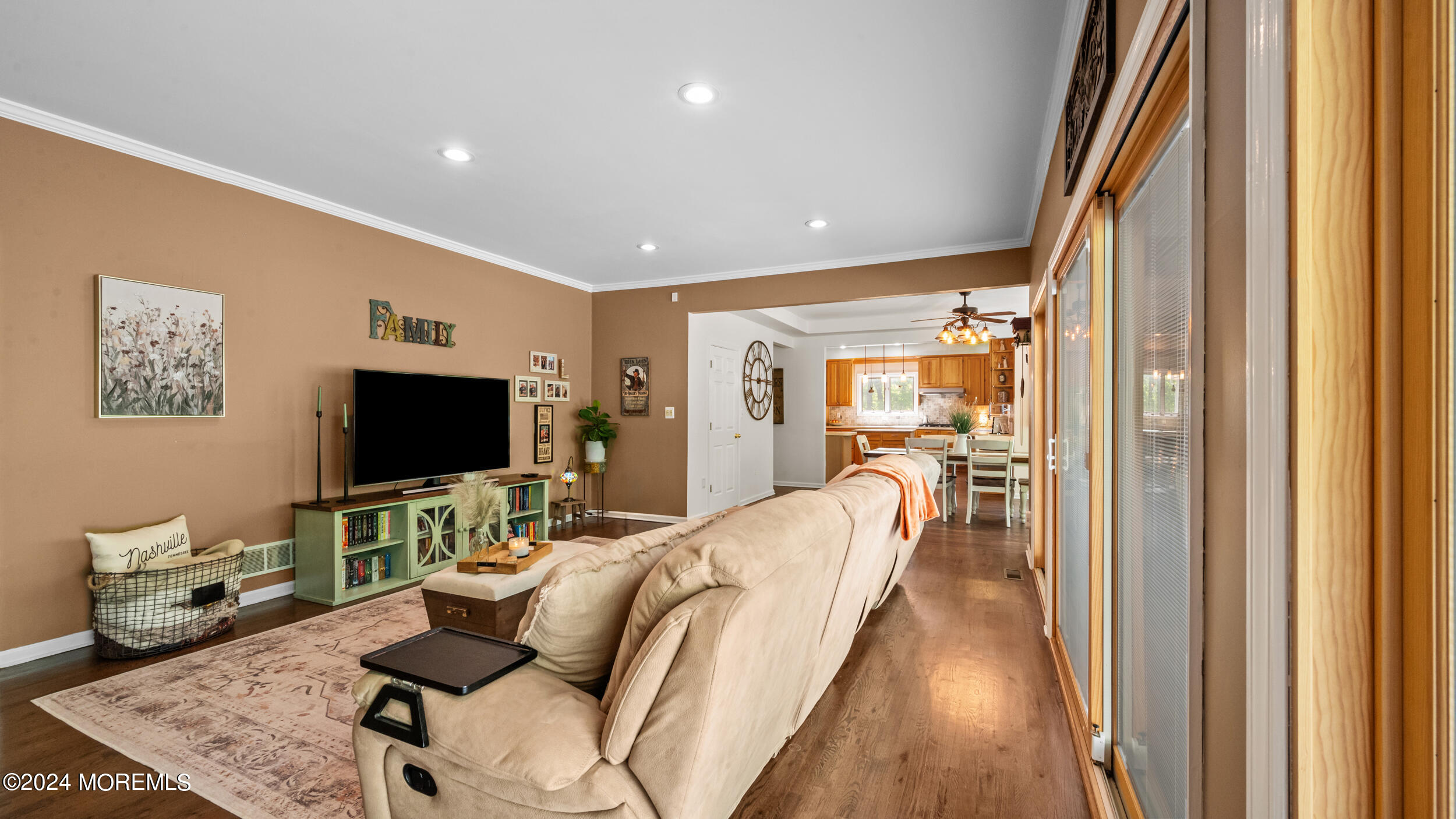 55 Tower Road Cream Ridge, NJ 08514 - Photo 26 of 47 a living room with furniture and a flat screen tv