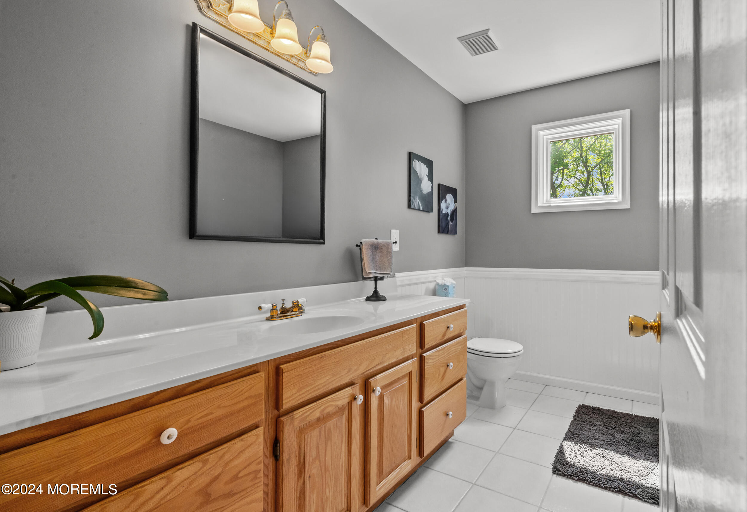 55 Tower Road Cream Ridge, NJ 08514 - Photo 32 of 47 a bathroom with a sink a toilet and mirror