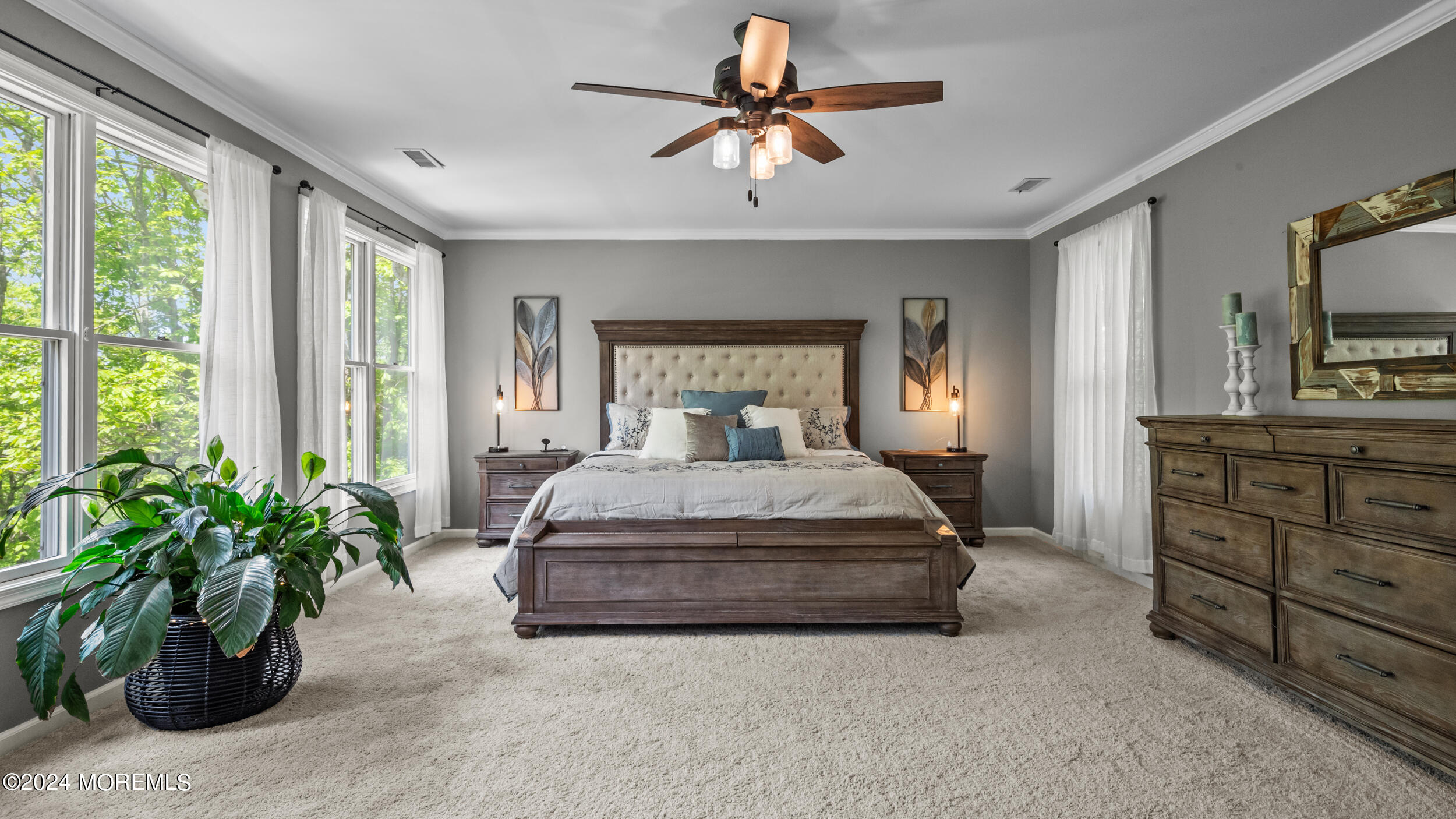 55 Tower Road Cream Ridge, NJ 08514 - Photo 33 of 47 a bedroom with a bed and a potted plant