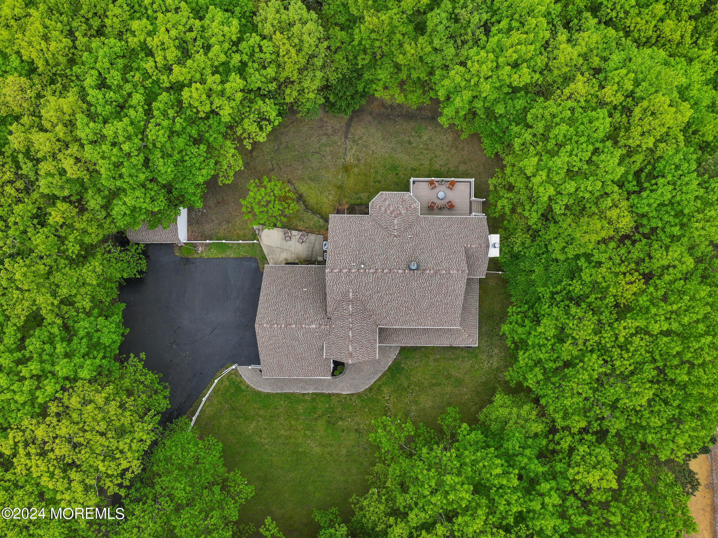 55 Tower Road Cream Ridge, NJ 08514 - Photo 46 of 47 an aerial view of a house with garden space and trees all around