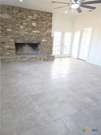 a view hallway with wooden floor and cabinet