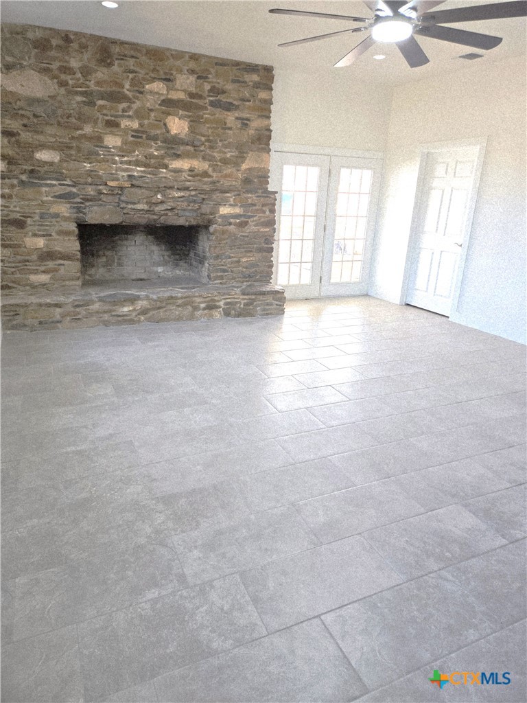 132 County Road 4765 Kempner, TX 76539 - Photo 11 of 36 wooden floor in an empty room with a window
