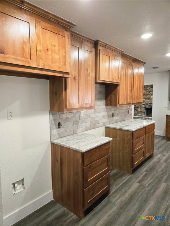132 County Road 4765 Kempner, TX 76539 - Photo 16 of 29 a kitchen with a stove a sink and a refrigerator