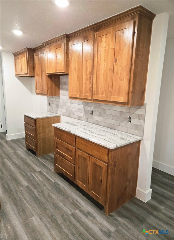 132 County Road 4765 Kempner, TX 76539 - Photo 17 of 29 a kitchen with stainless steel appliances granite countertop a sink a stove and a wooden floors