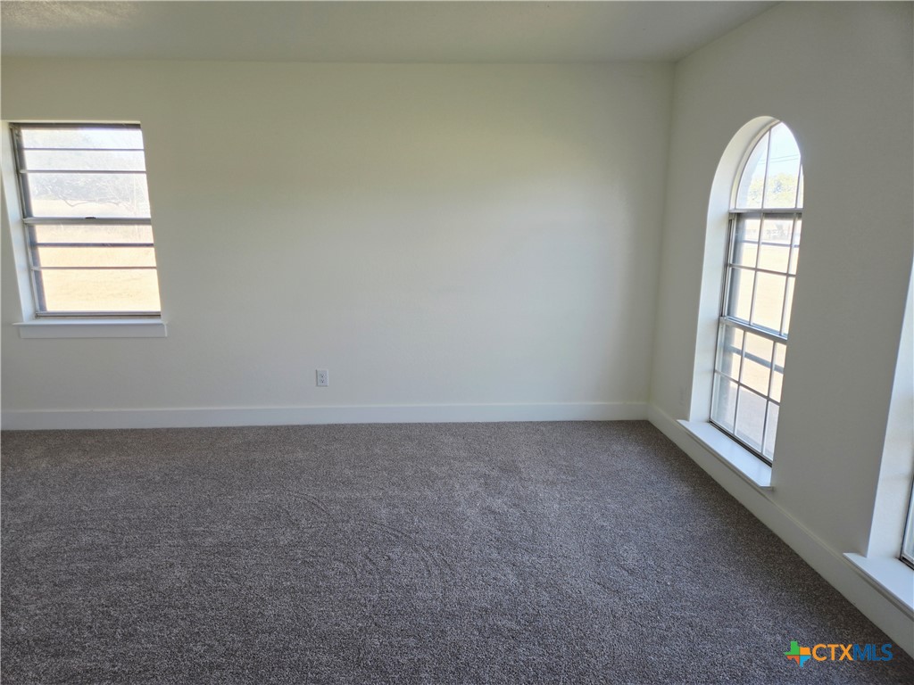 132 County Road 4765 Kempner, TX 76539 - Photo 21 of 29 an empty room with windows