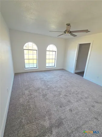 a view of front door with wooden floor