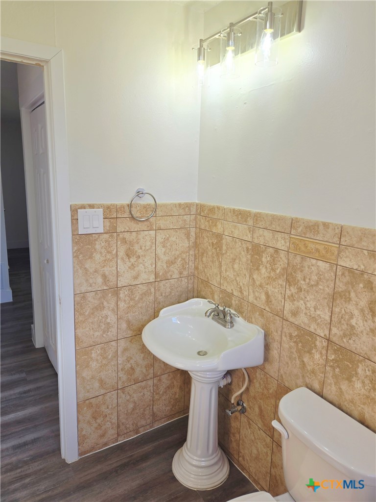 132 County Road 4765 Kempner, TX 76539 - Photo 31 of 36 a bathroom with a sink toilet and shower