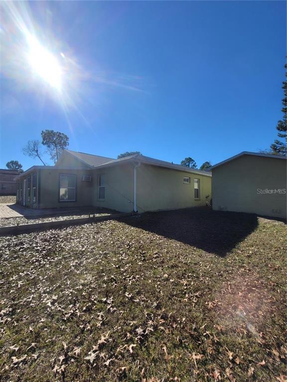 8430 Madrid Road Weeki Wachee, FL 34613 - Photo 10 of 11 a view of a backyard