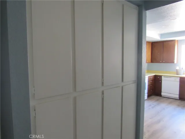 a view of a kitchen from the hallway