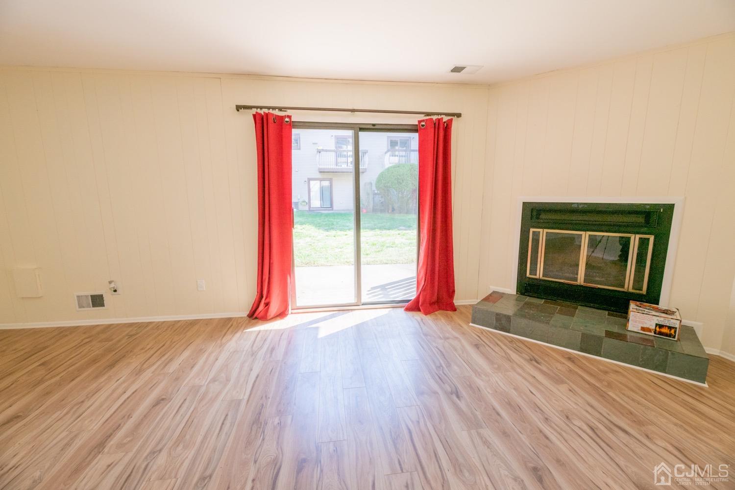 7101 Hana Road Edison, NJ 08817 - Photo 35 of 77 a view of a room with wooden floor and a sink