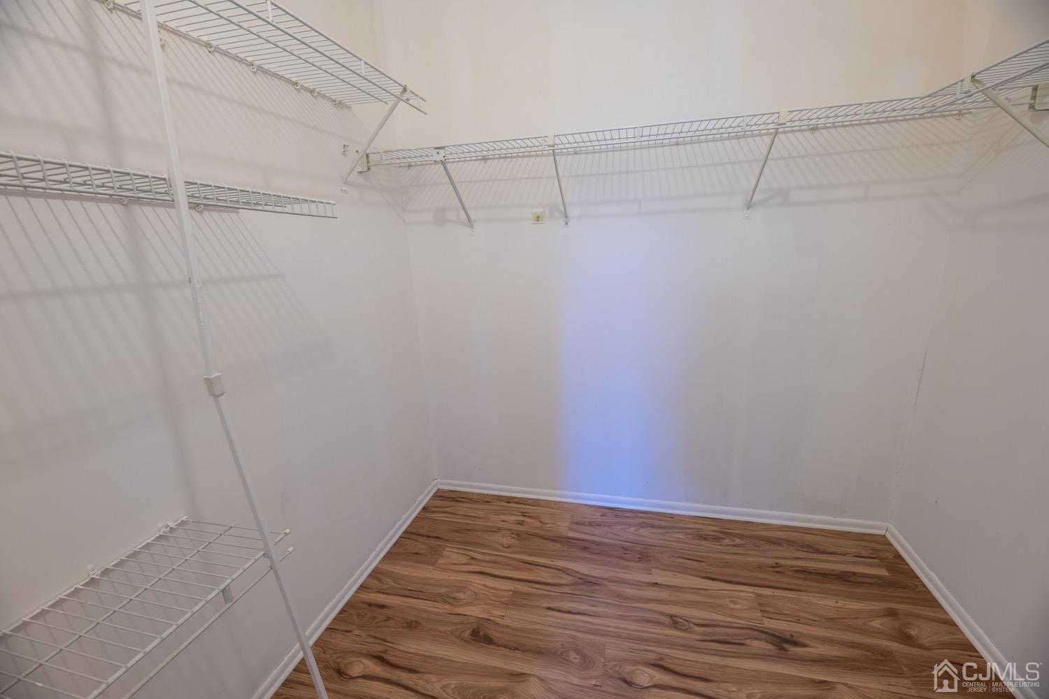 7101 Hana Road Edison, NJ 08817 - Photo 56 of 77 a view of a room with racks on the wall