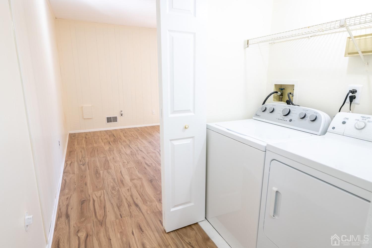 7101 Hana Road Edison, NJ 08817 - Photo 62 of 77 a utility room with dryer and washer