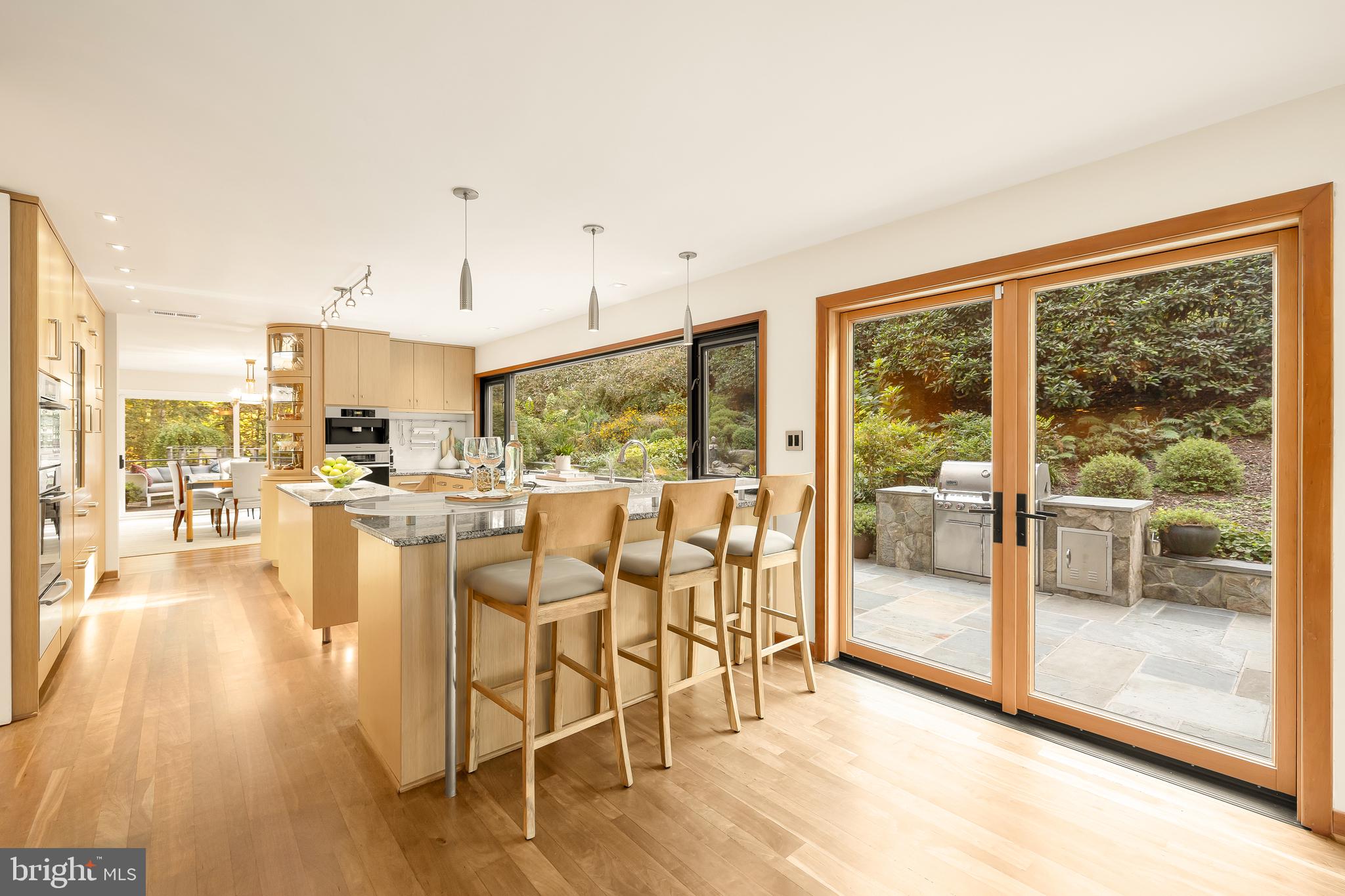 249 Springvale Road Great Falls, VA 22066 - Photo 14 of 49 a dining room with furniture and wooden floor