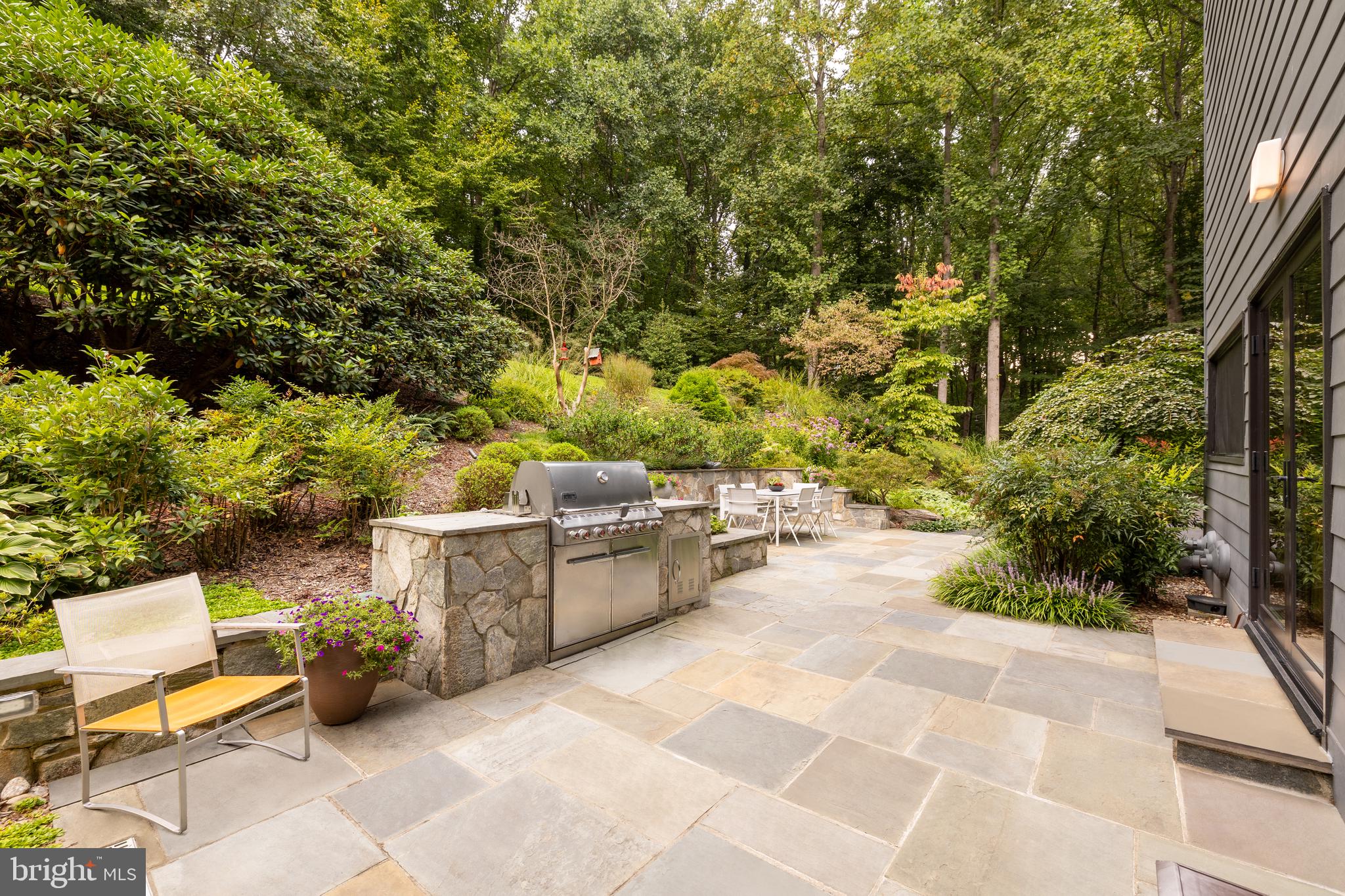249 Springvale Road Great Falls, VA 22066 - Photo 19 of 49 a view of a patio with couches and potted plants