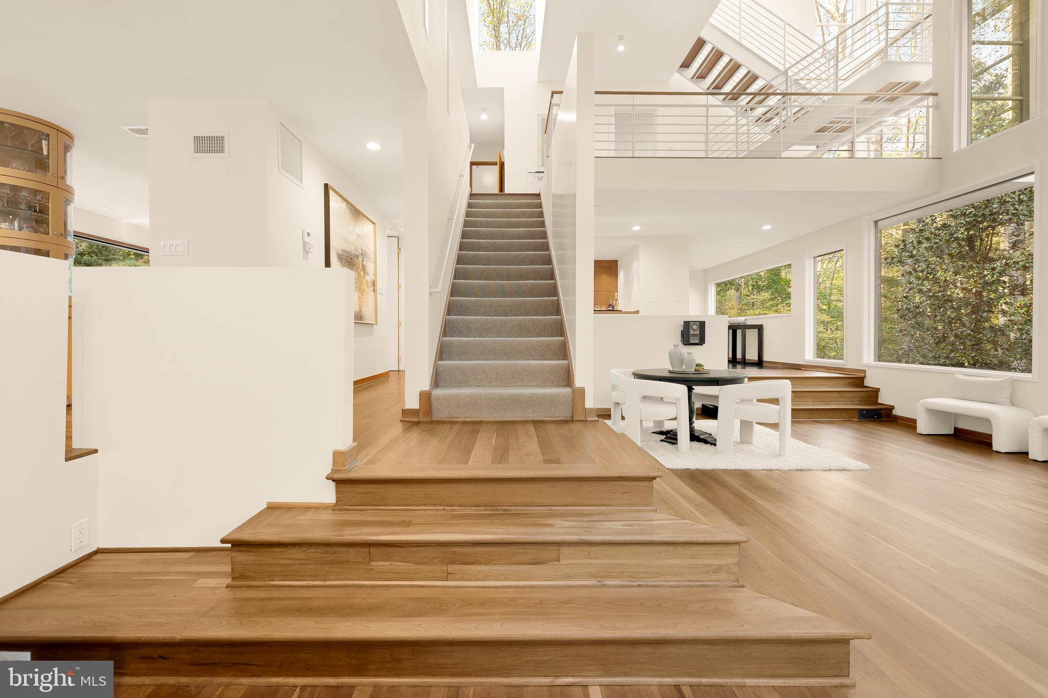 249 Springvale Road Great Falls, VA 22066 - Photo 20 of 49 a view of entryway and hall with wooden floor
