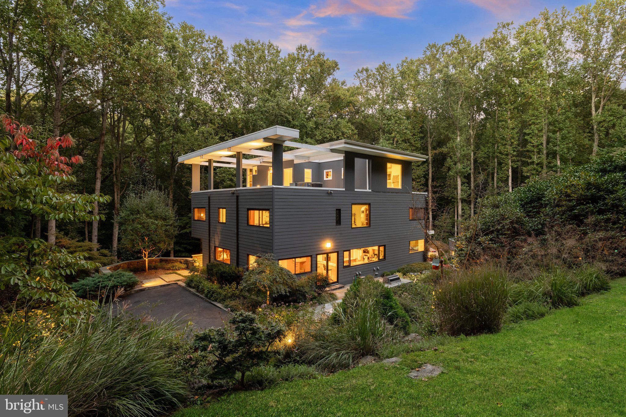 249 Springvale Road Great Falls, VA 22066 - Photo 3 of 49 a front view of a house with a yard