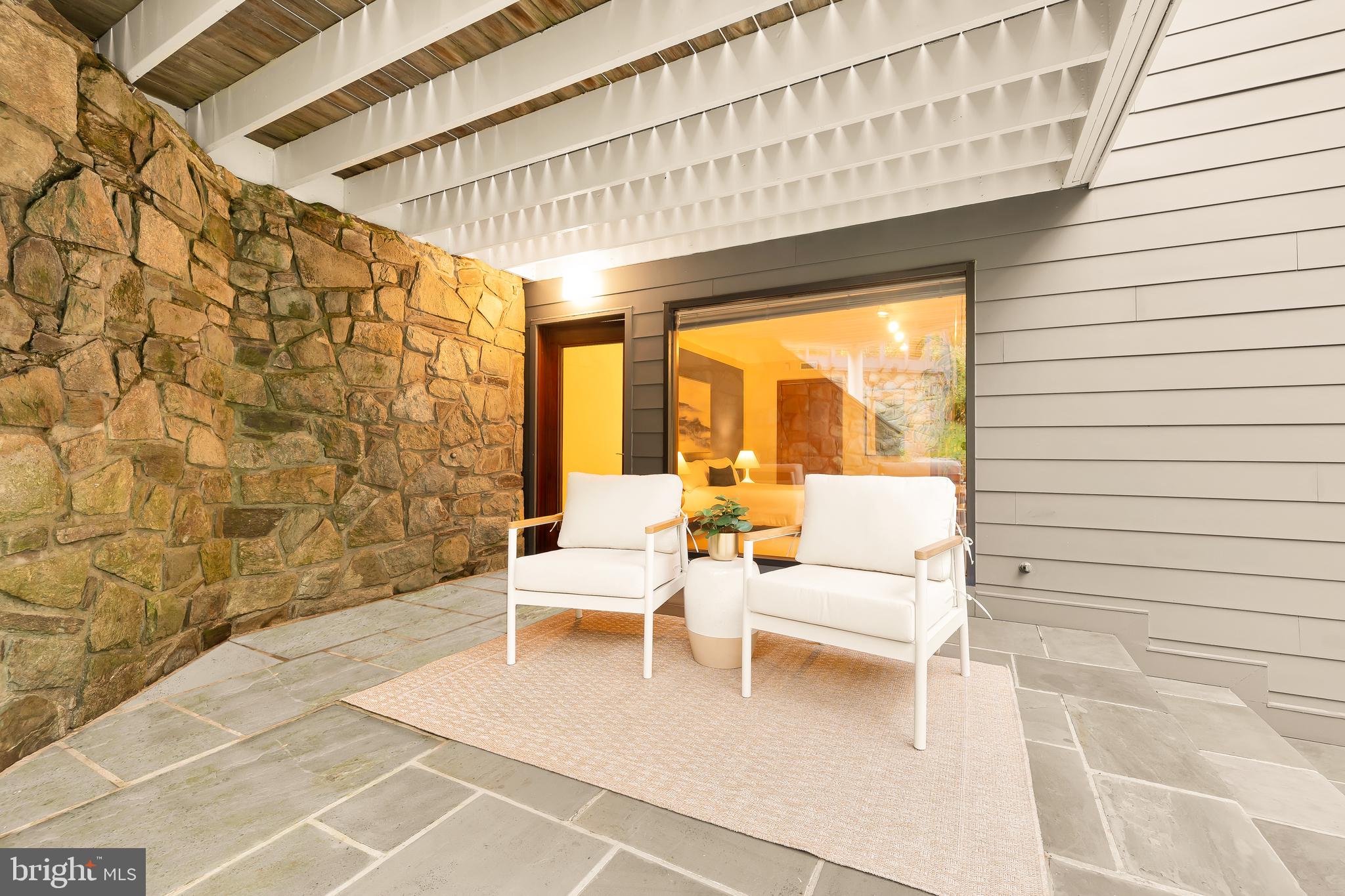 249 Springvale Road Great Falls, VA 22066 - Photo 40 of 49 a balcony with chairs and outdoor space
