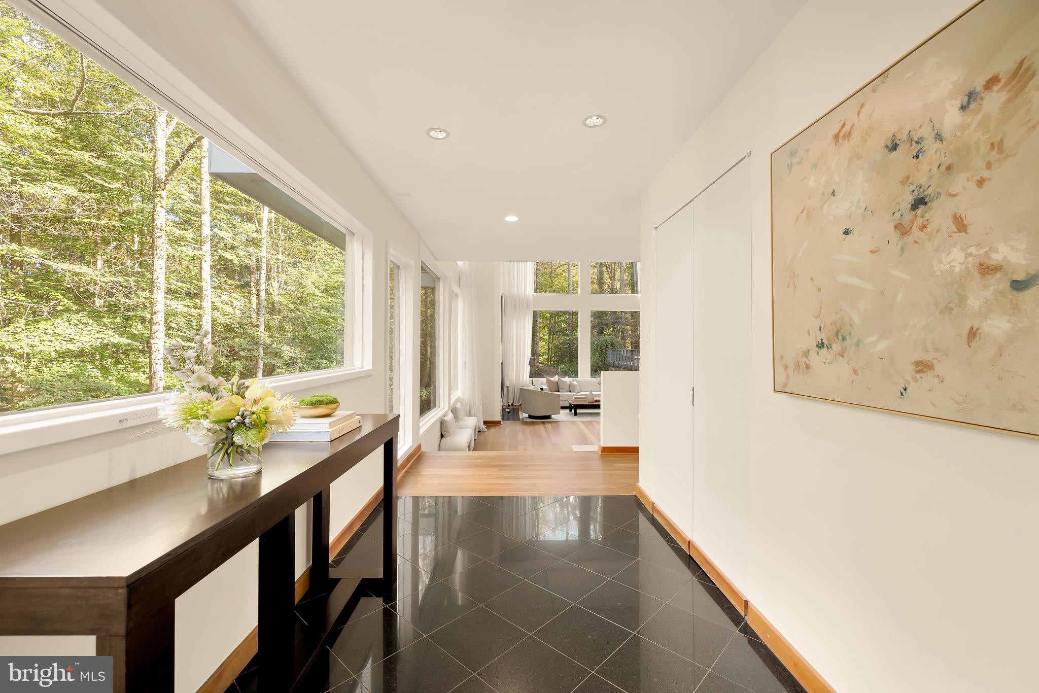 249 Springvale Road Great Falls, VA 22066 - Photo 4 of 49 a dining room with furniture and a large window