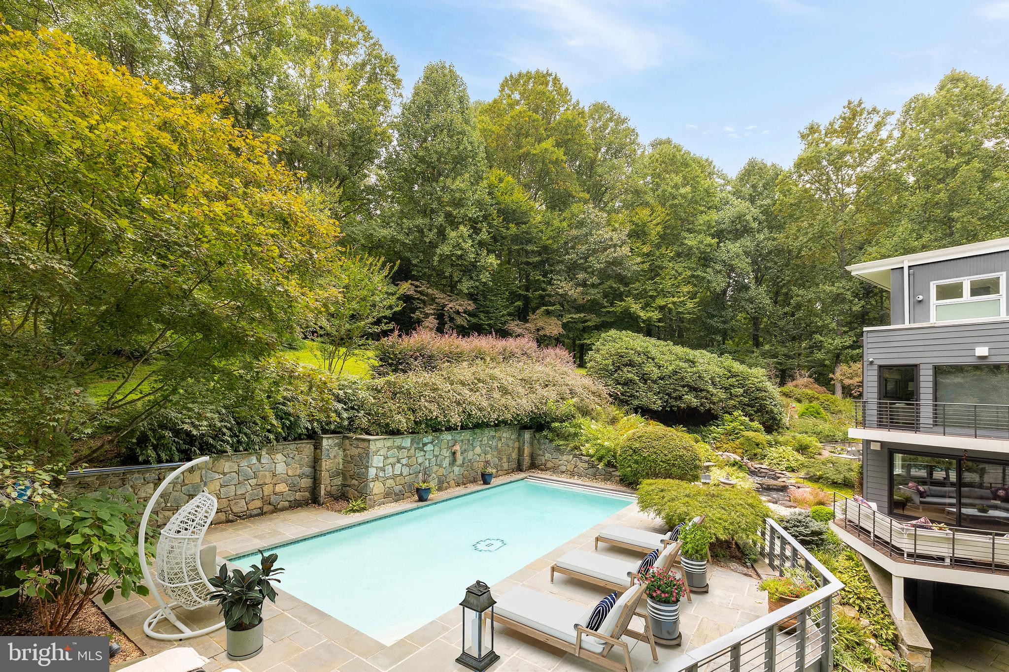 249 Springvale Road Great Falls, VA 22066 - Photo 46 of 49 a view of a swimming pool with a patio