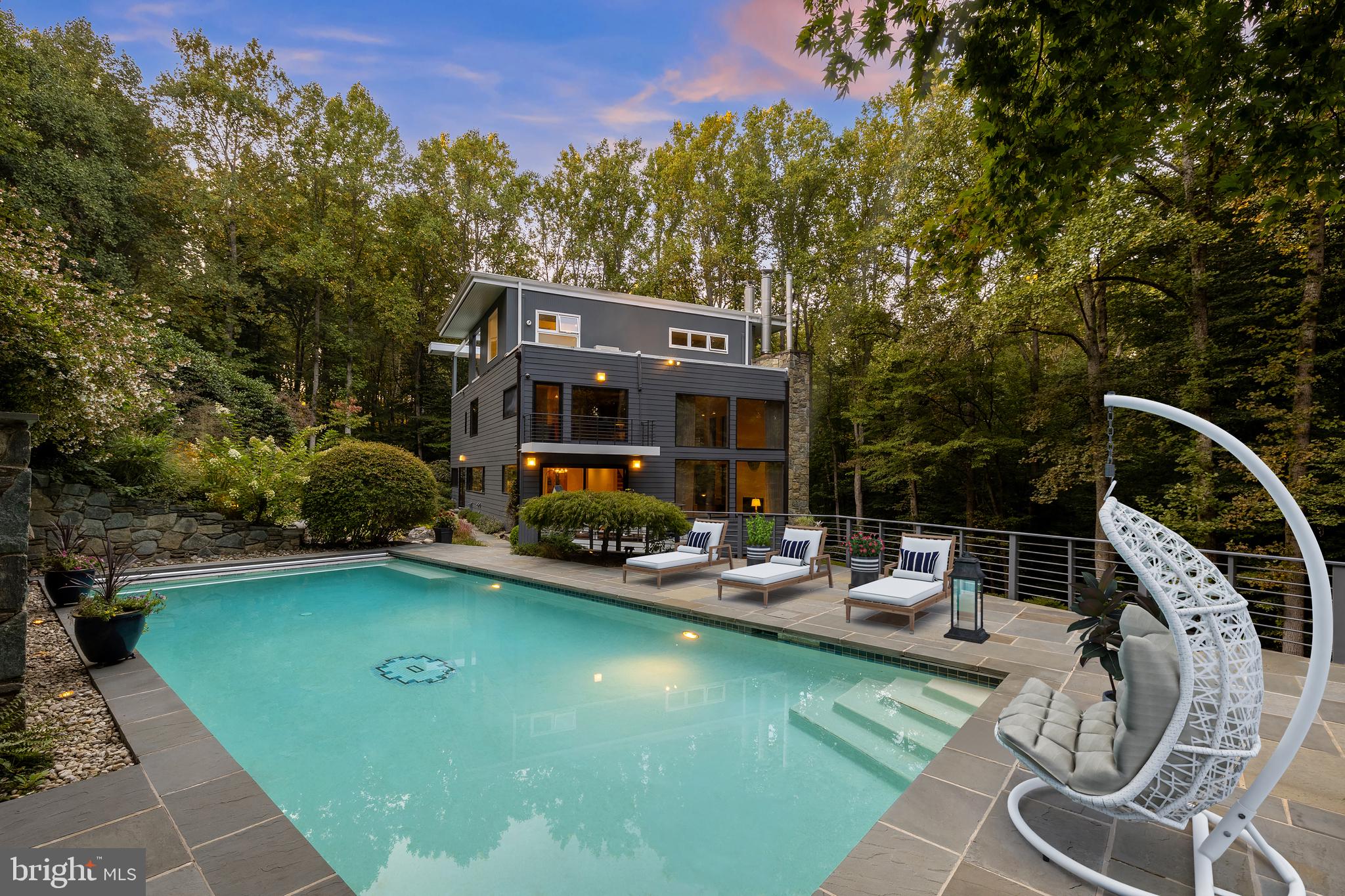 249 Springvale Road Great Falls, VA 22066 - Photo 47 of 49 a view of a swimming pool with lounge chairs