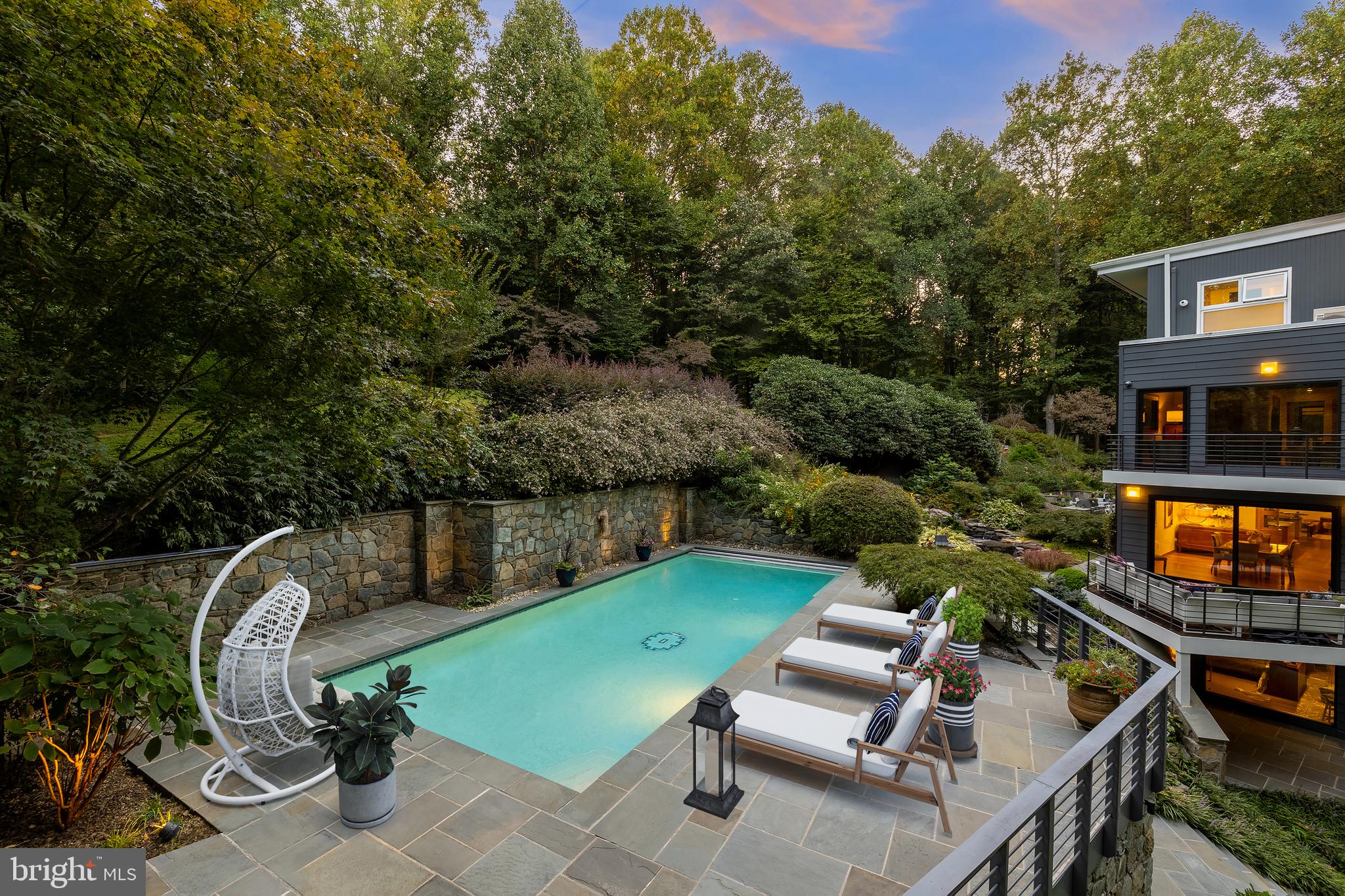 249 Springvale Road Great Falls, VA 22066 - Photo 48 of 49 an outdoor sitting area with a swimming pool
