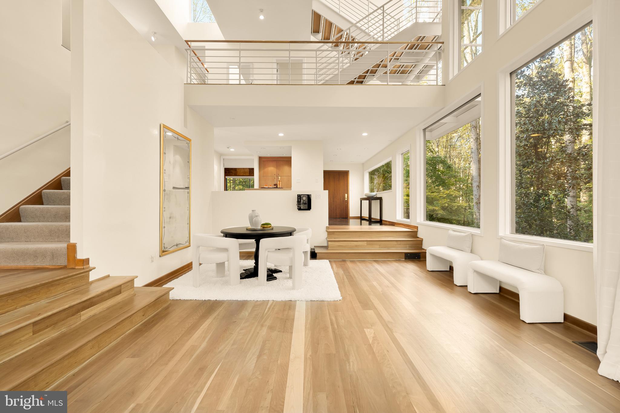 249 Springvale Road Great Falls, VA 22066 - Photo 8 of 49 a living room with furniture and a large window