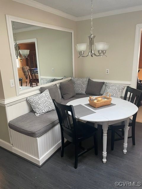 127 Wickham Road Bumpass, VA 23024 - Photo 6 of 10 Dining space with a chandelier, dark wood-style fl