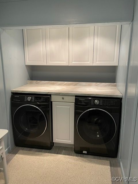 127 Wickham Road Bumpass, VA 23024 - Photo 9 of 10 Laundry room featuring cabinet space and light woo