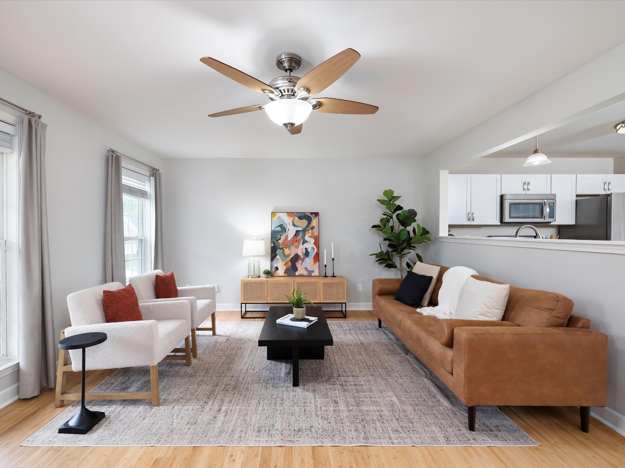 1007 Persimmon Drive Spring Hill, TN 37174 - Photo 11 of 44 a living room with furniture and a chandelier