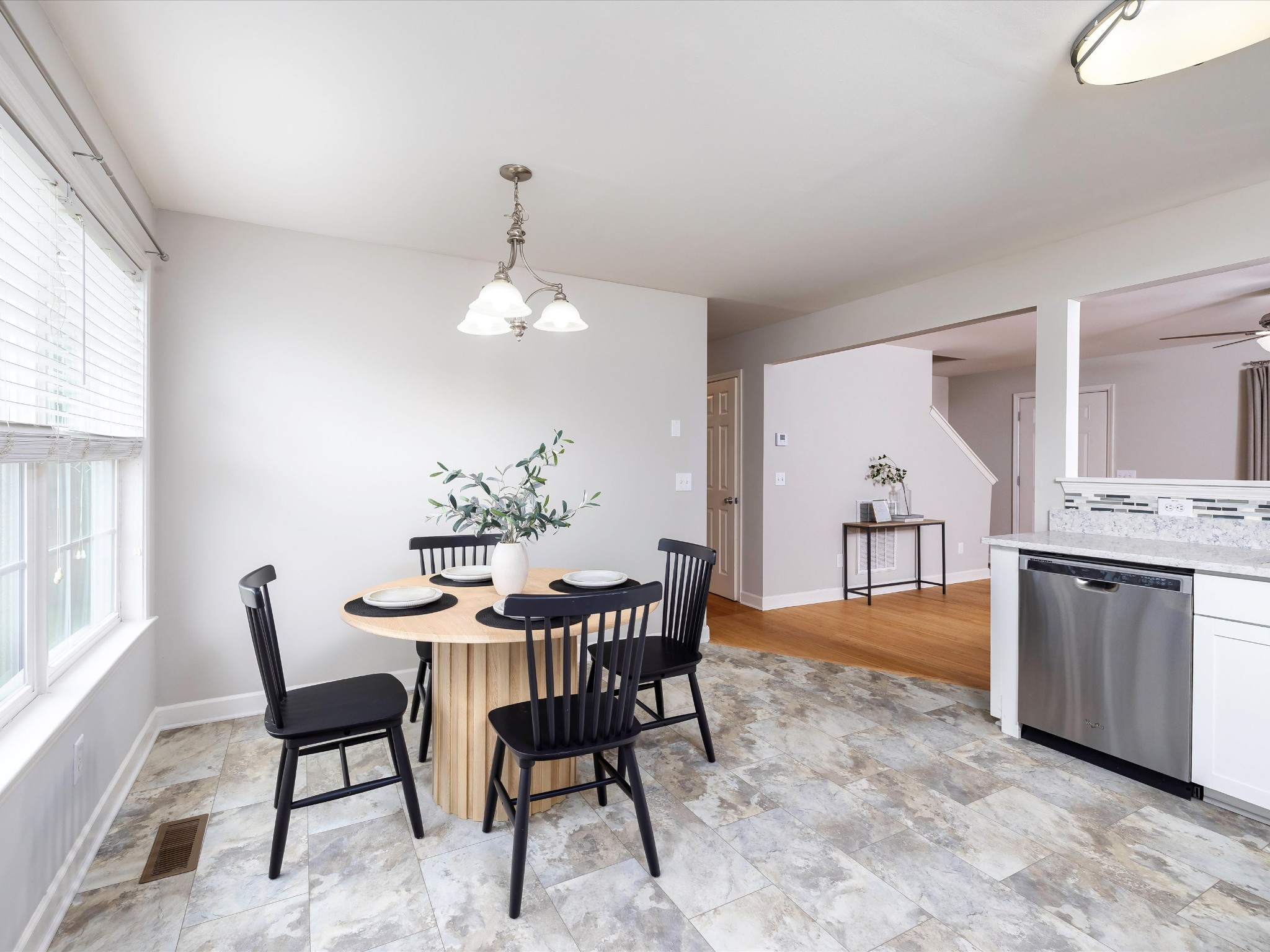 1007 Persimmon Drive Spring Hill, TN 37174 - Photo 16 of 44 a view of a dining room with furniture and window