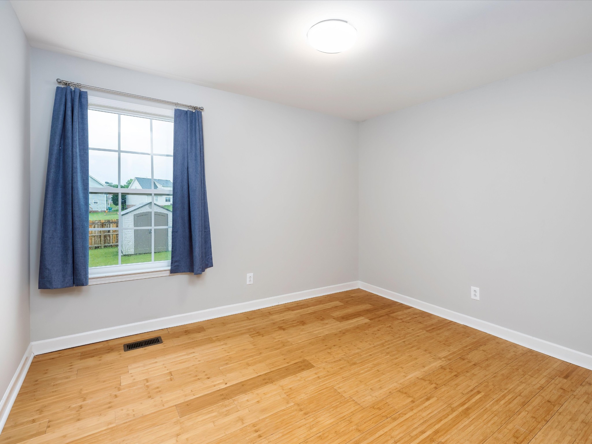 1007 Persimmon Drive Spring Hill, TN 37174 - Photo 18 of 44 a view of an empty room with a window