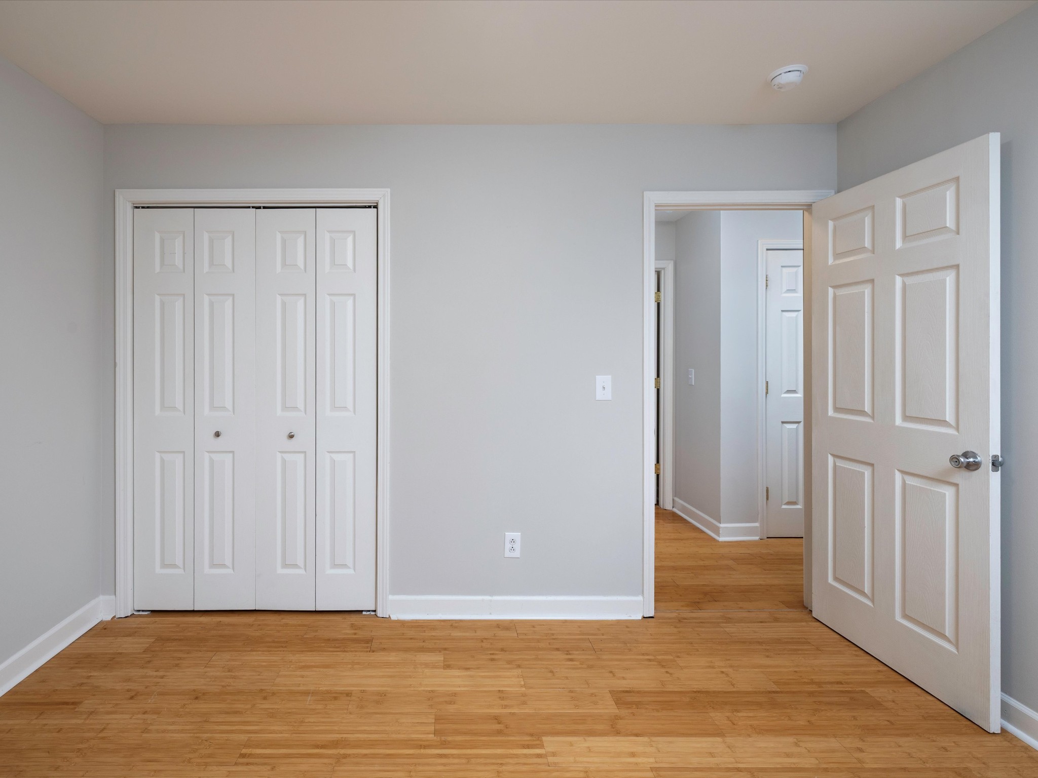 1007 Persimmon Drive Spring Hill, TN 37174 - Photo 19 of 44 a view of an empty room with wooden floor