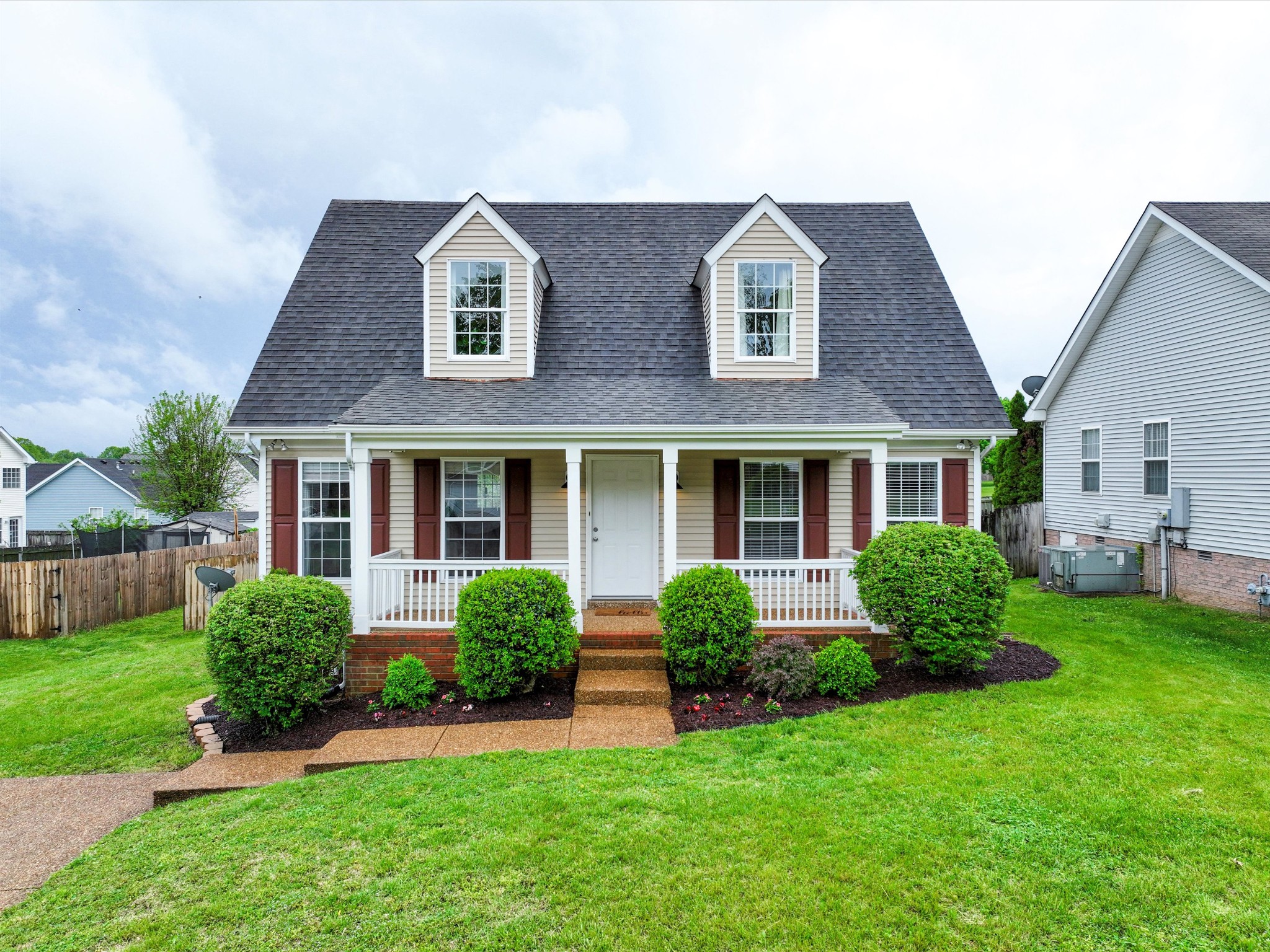 1007 Persimmon Drive Spring Hill, TN 37174 - Photo 2 of 44 a front view of a house with a yard