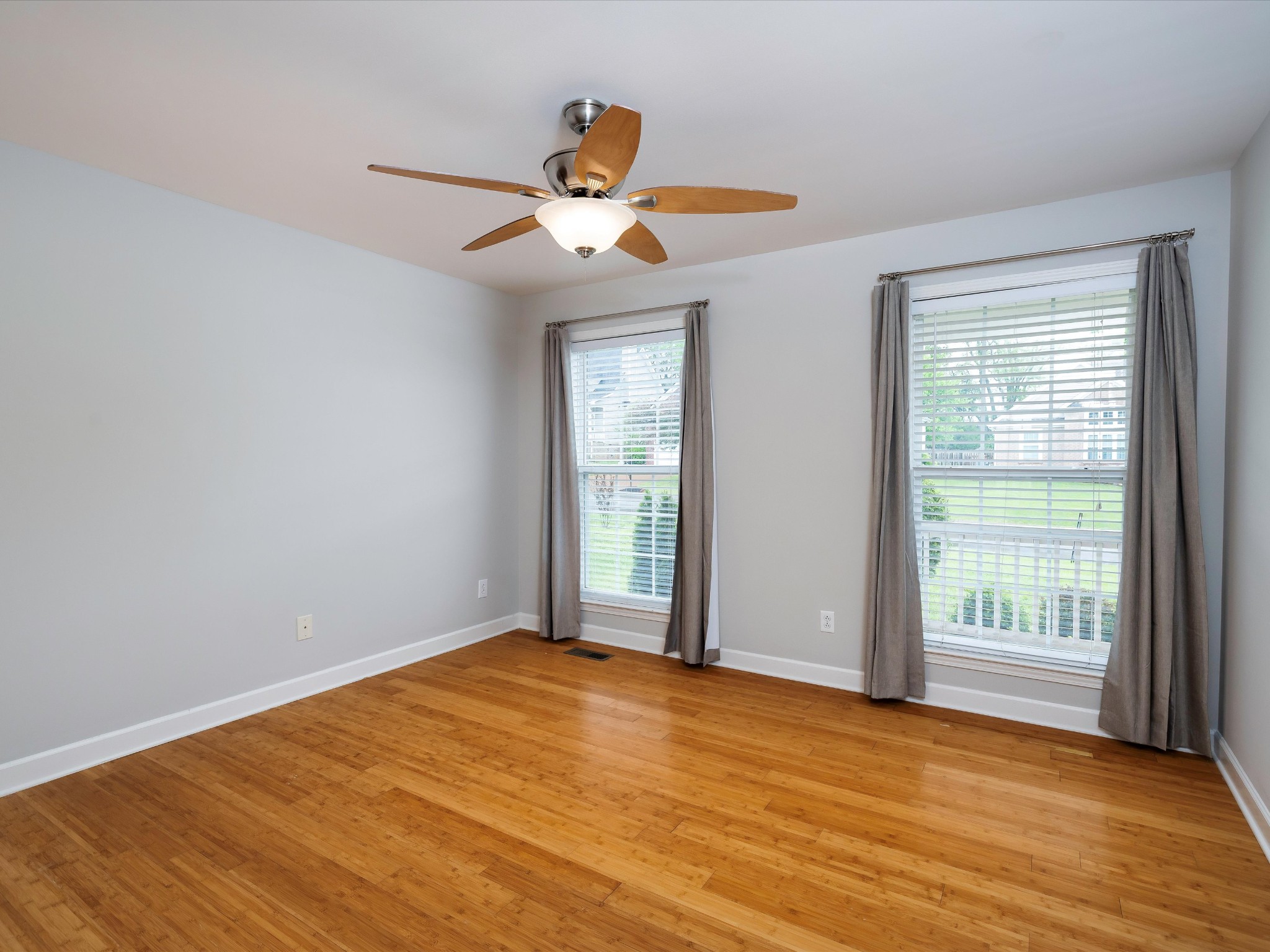 1007 Persimmon Drive Spring Hill, TN 37174 - Photo 21 of 44 a view of empty room with wooden floor and fan